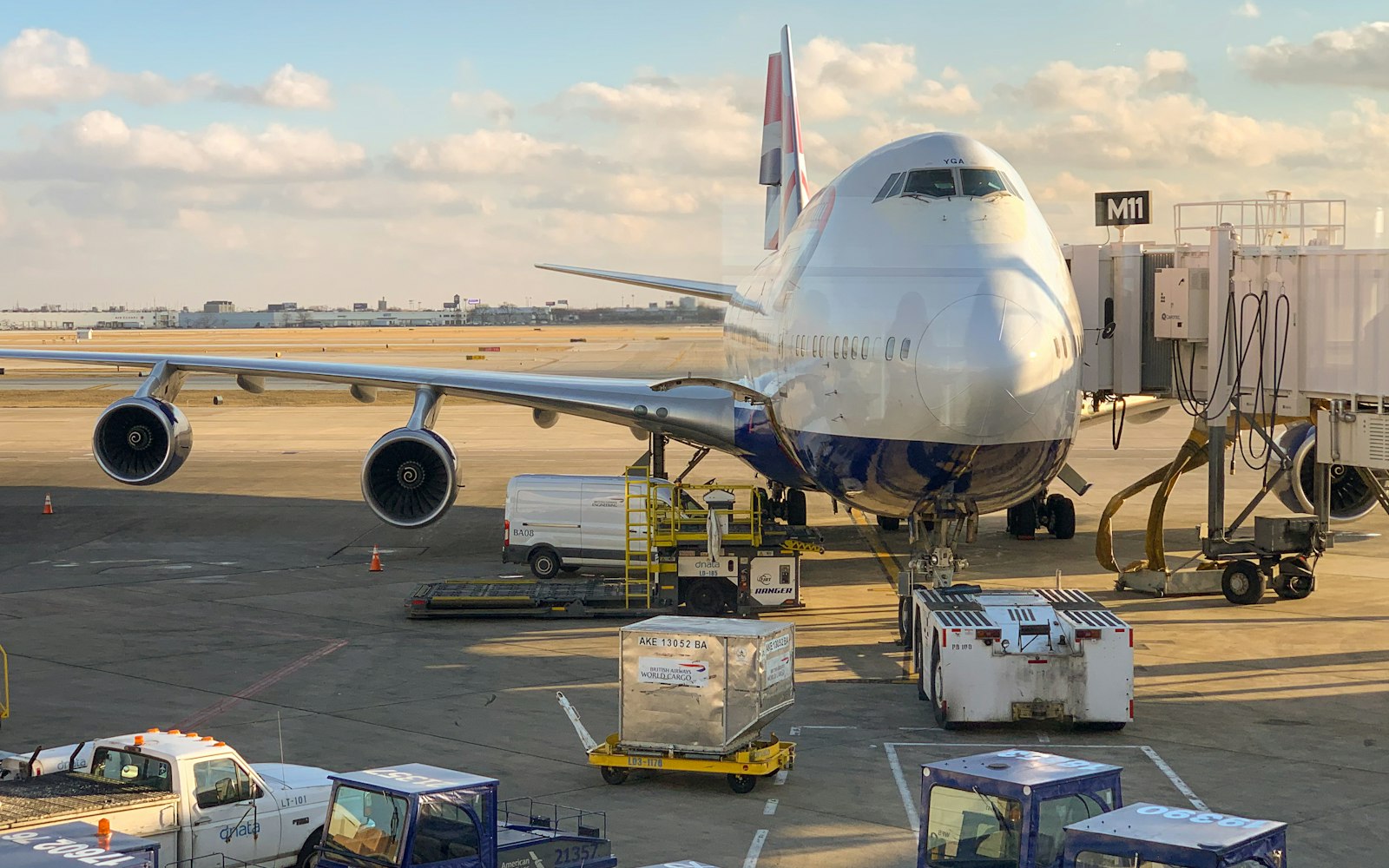 Cargo aircraft being loaded with air freight containers